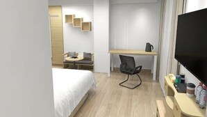 A hotel room with a bed, a desk, a chair, a television, and a small seating area with a table and chairs. - Xiaocheng Zhilv Hotel (Cenxi)