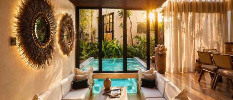 Luxury Villa | Living area | 55-inch LED TV with cable channels