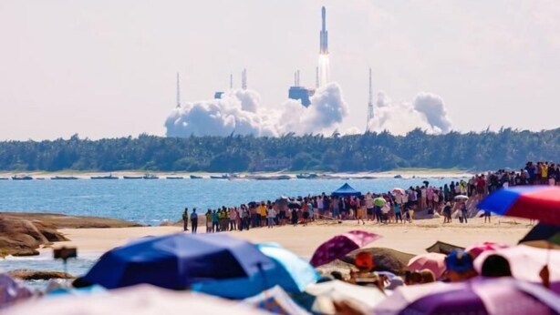 A beach with a rocket launch in the background. - Wenchang Ruyi Hotel (Wenchang)