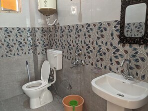 Shower, bidet, towels, soap