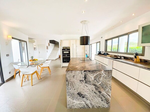 Fridge, microwave, oven, stovetop - Villa Louna – Stunning Sea Views, Heated Pool & Luxury Living (3BR) (Anse Marcel)