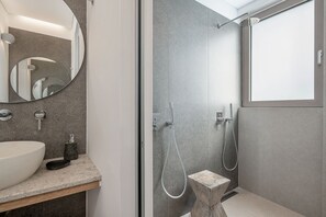 Shower, towels, soap, shampoo