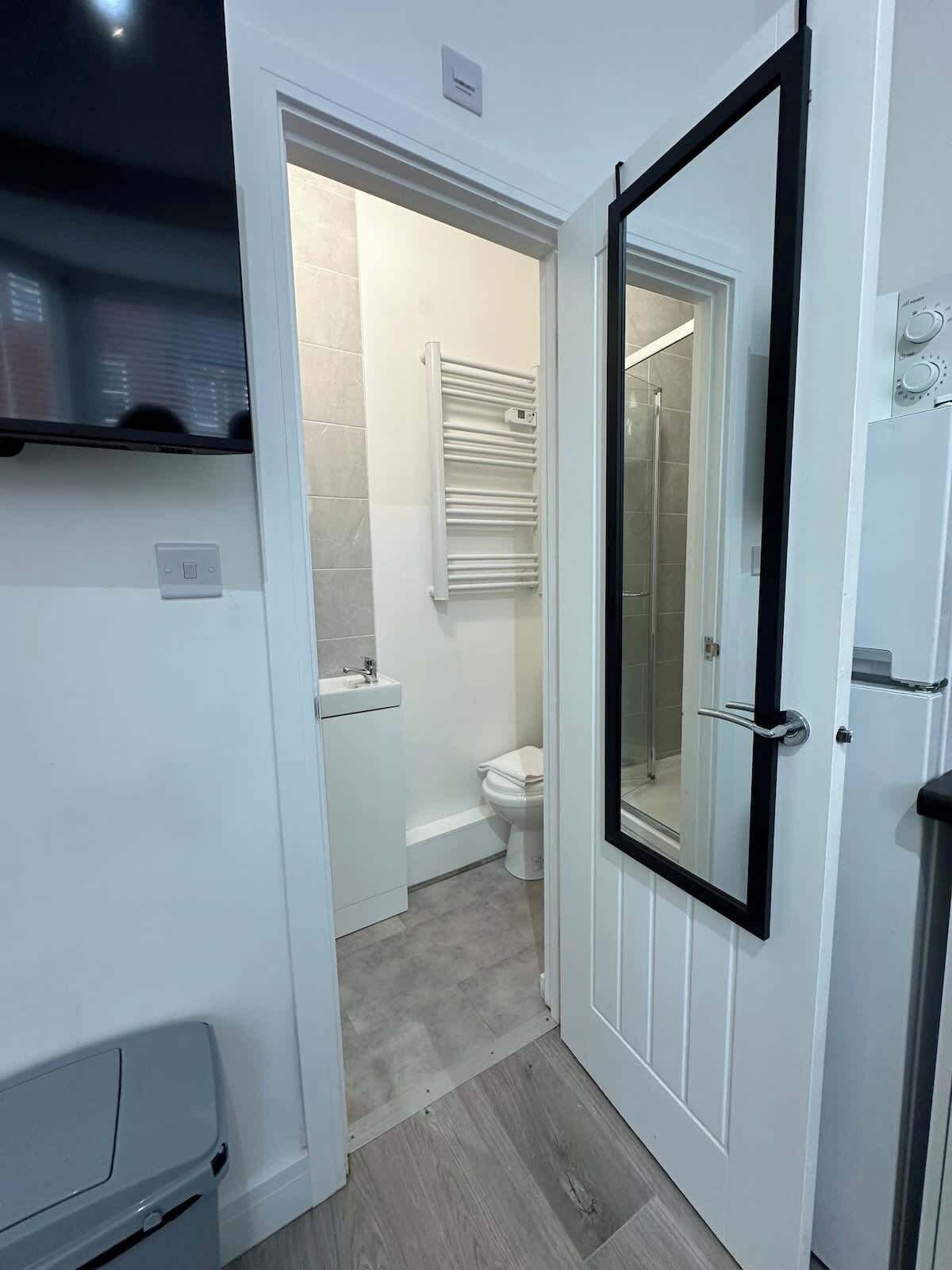 Shower, hair dryer, shampoo