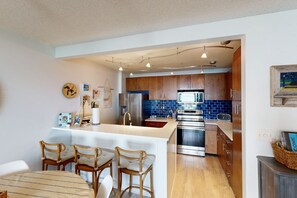 Fridge, microwave, oven, stovetop - Single-level lakefront hideaway with a deck, fireplace, & washer/dryer (Glen Arbor)