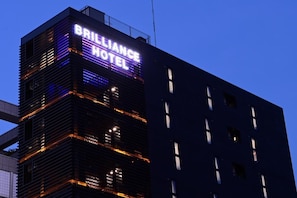 A building with a sign that reads "BRILLIANCE HOTEL" in illuminated letters. - BRILLIANCE HOTEL (Nagoya)