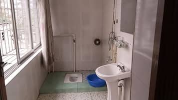 Shower, slippers, shampoo