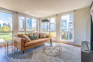 Deluxe Apartment, Park View | Living area | Smart TV - Sophari Parkside: Bellevue Apartments (Bellevue)