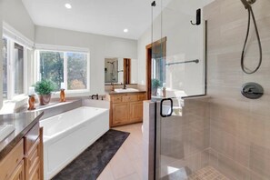 Jetted tub, hair dryer, towels, soap