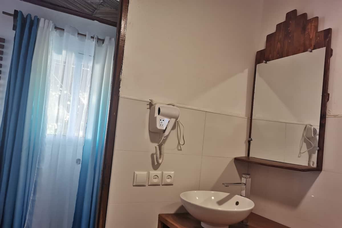 Family Bungalow, 2 Bedrooms, Sea View, Beachside | Bathroom amenities | Shower, hair dryer, towels, soap