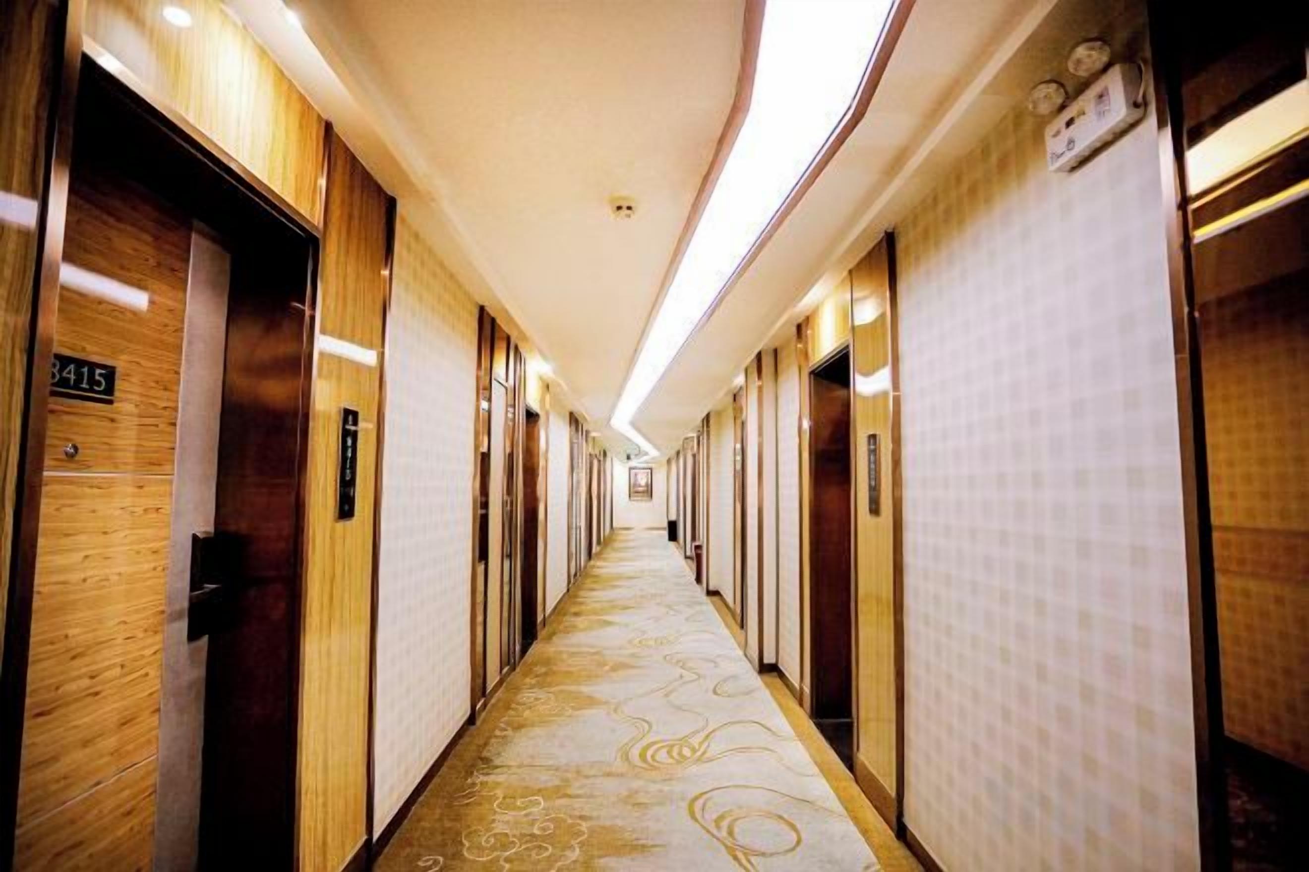 A hotel hallway with doors numbered 3415, 3416, and 3417.