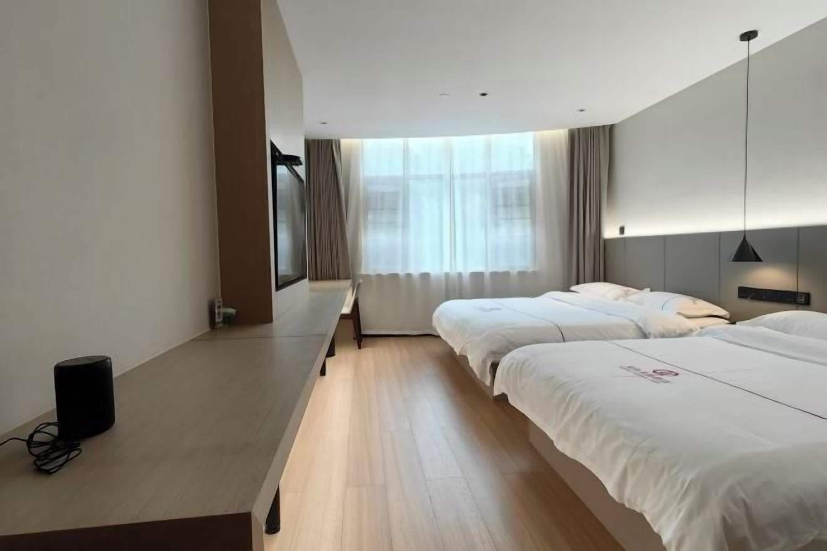 Desk, blackout drapes, iron/ironing board, bed sheets