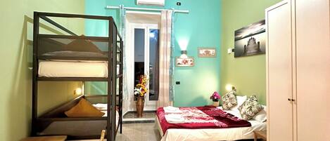 Deluxe Quadruple Room, City View | Premium bedding, memory foam beds, individually decorated