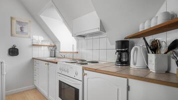 Réfrigérateur, plaque de cuisson, cafetiÚre/bouilloire