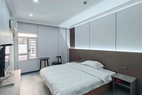 Quarto. Hengyang Wangguo Shangwu Hotel