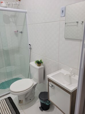 Shower, towels, soap, toilet paper