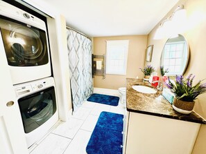 Hair dryer, towels, soap, toilet paper