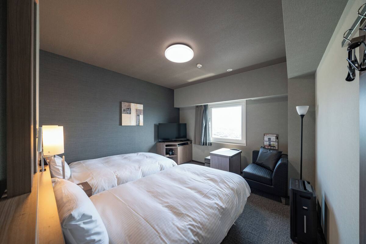 Desk, iron/ironing board (on request), WiFi (free), bed sheets