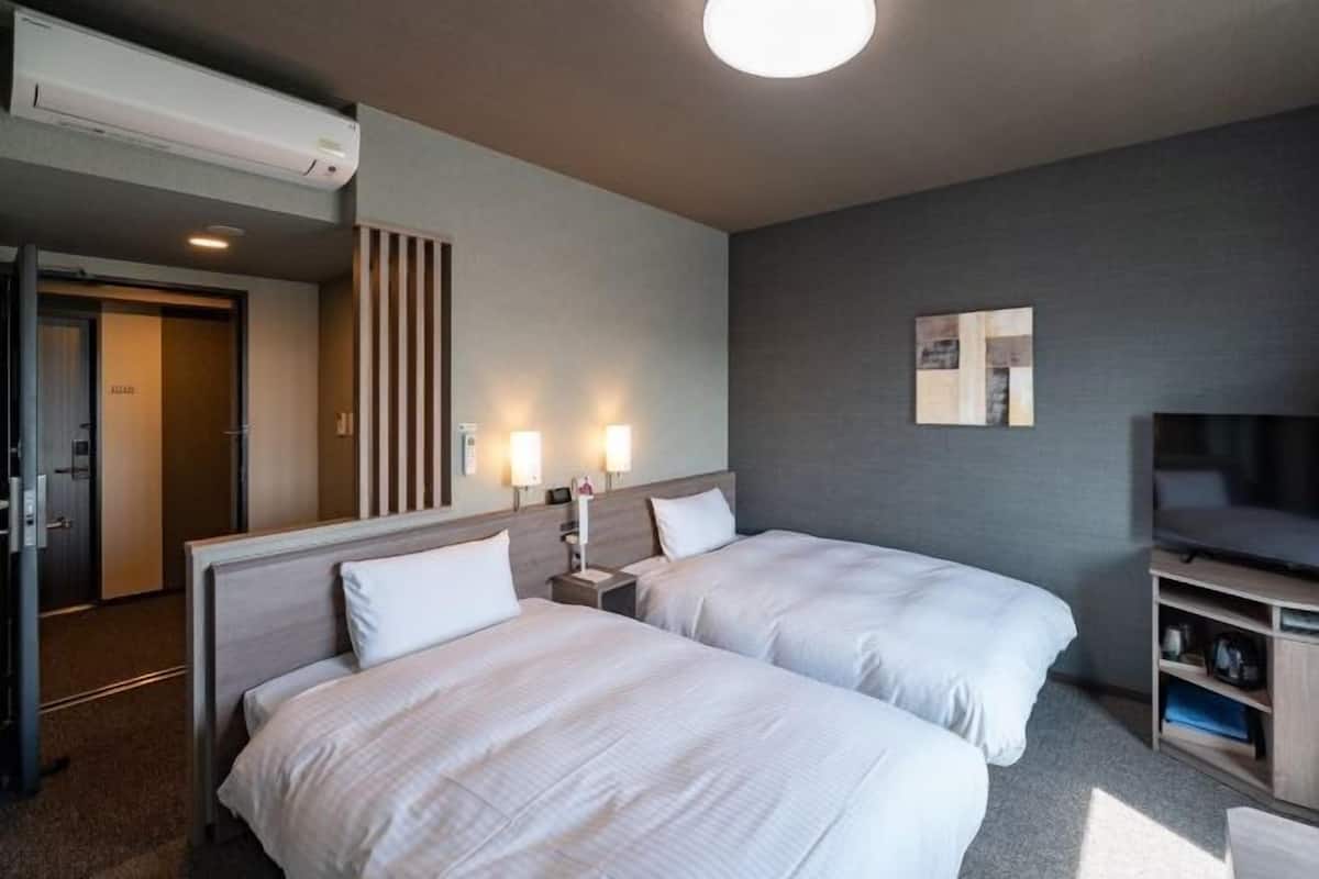 Desk, iron/ironing board, free WiFi, bed sheets