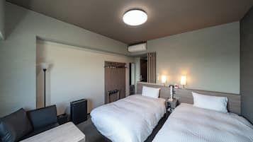 Chambre Confort avec lits jumeaux, non-fumeurs | Bureau, fer et planche à repasser, Wi-Fi gratuit, draps fournis