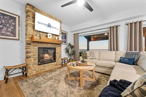 TV, fireplace, table football - Panoramic Table Rock Lake Views with Hot Tub, Games & Free Branson Attraction Tickets (Hollister)