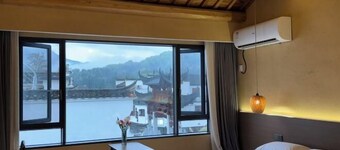 Jingxian Comfy Hotel
