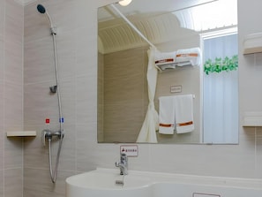 A bathroom with a shower, sink, and a large mirror. - Thank You Inn Beijing Huairou Yanqi (Huairou)