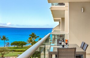 Outdoor dining - Bright & Modern 2BR on the 6th Floor with Stunning Ocean & Pool Views! (Lahaina)