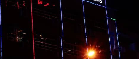 A building with illuminated signage, including a prominent 'e' logo and Chinese characters.