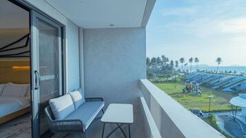 Junior Suite, Multiple Beds, Beach View | Terrace/patio