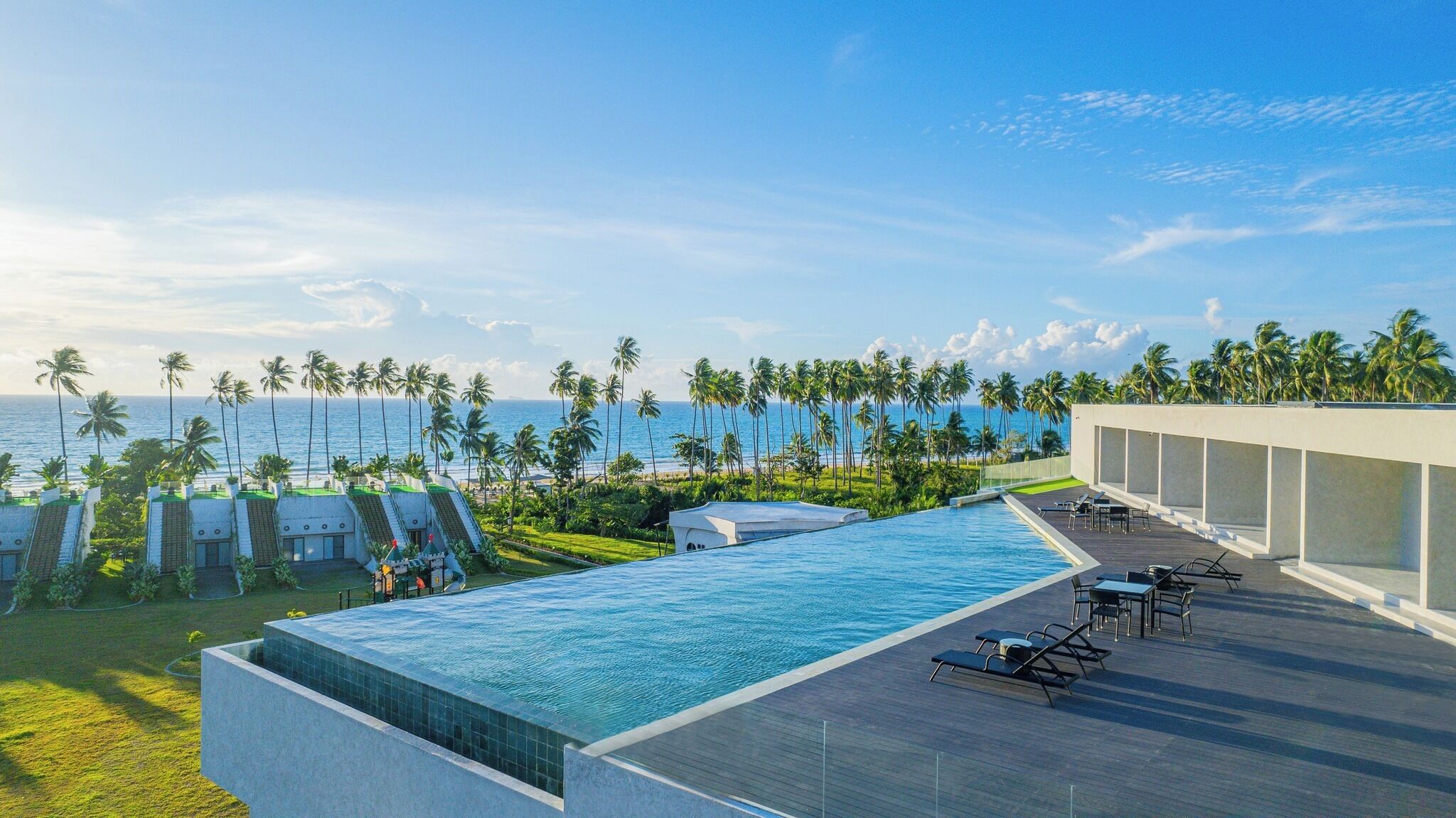 2 outdoor pools, open 6:00 AM to 10:00 PM, pool umbrellas