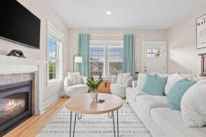 Smart TV, fireplace, books