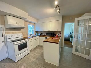 Fridge, microwave, dishwasher, coffee/tea maker