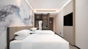 Classic Twin Room | Down comforters, minibar, in-room safe, blackout drapes