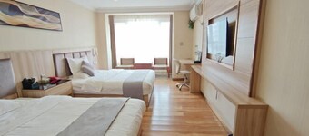 Qingzhu Yuexiang Hotel (Tangshan Yutian Bus Station)