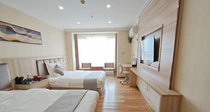 Qingzhu Yuexiang Hotel (Tangshan Yutian Bus Station)