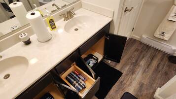 Hair dryer, towels, soap, shampoo