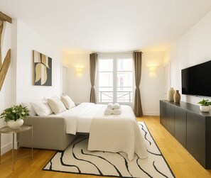 1 bedroom, desk, iron/ironing board, travel crib