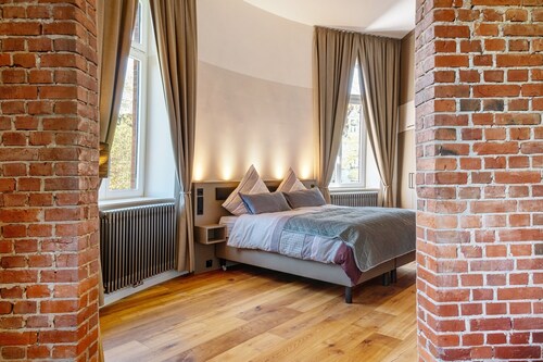 Ferienwohnung Wasserturm 'Erstes Obergeschoss'Parksicht