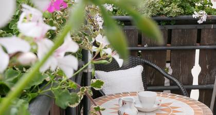 Ferienwohnung Höll" mit privater Terrasse, Gemeinschaftsgarten und WLAN