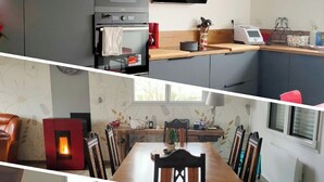 Une cuisine moderne équipée d’un four encastré, d’une machine à café et d’un téléviseur.