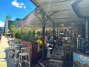 Outdoor dining - Menlyn Maine Residence King sized bed with patio - Paris (Pretoria)