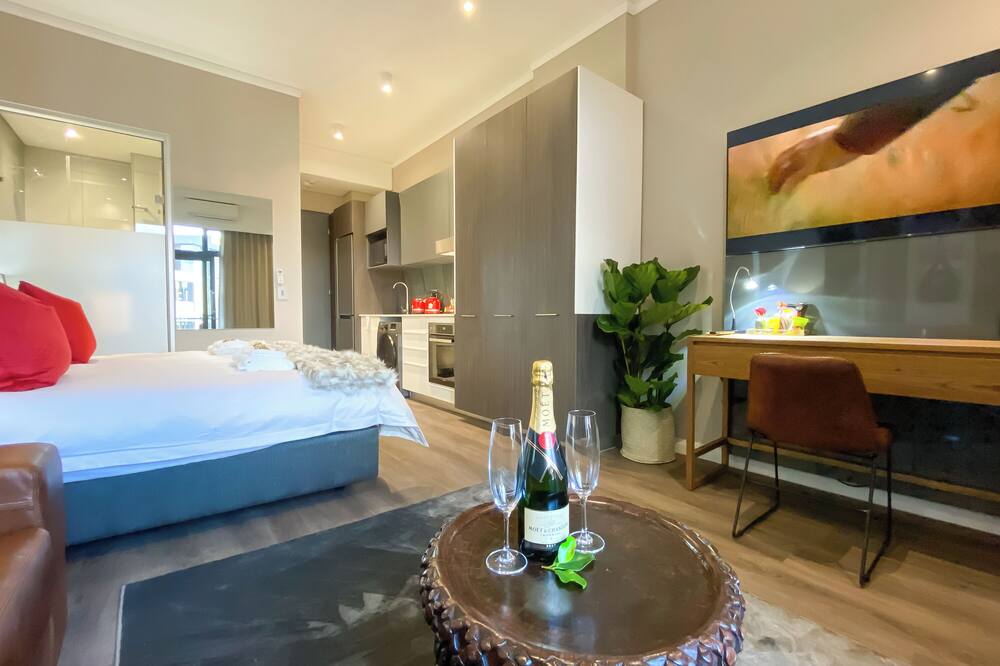 Menlyn Maine Residence King sized bed with patio - Paris