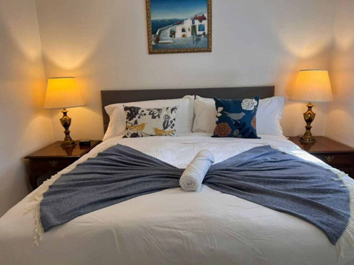 1 bedroom, desk, iron/ironing board, travel crib