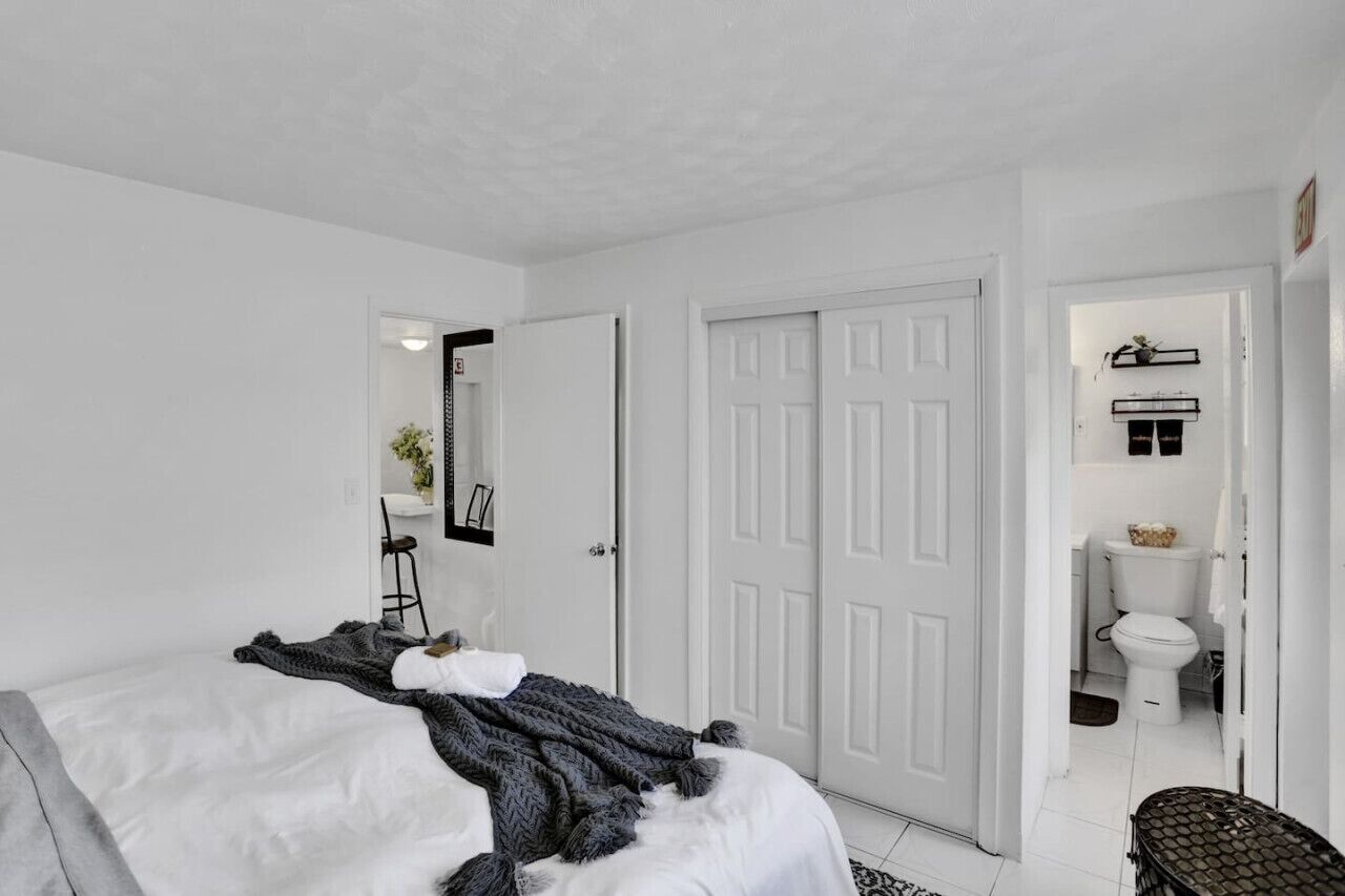 1 bedroom, desk, iron/ironing board, travel crib