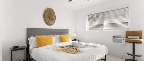 1 bedroom, desk, iron/ironing board, travel crib