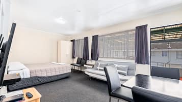 Business Apartment, 1 Bedroom | 1 bedroom, desk, blackout curtains, iron/ironing board