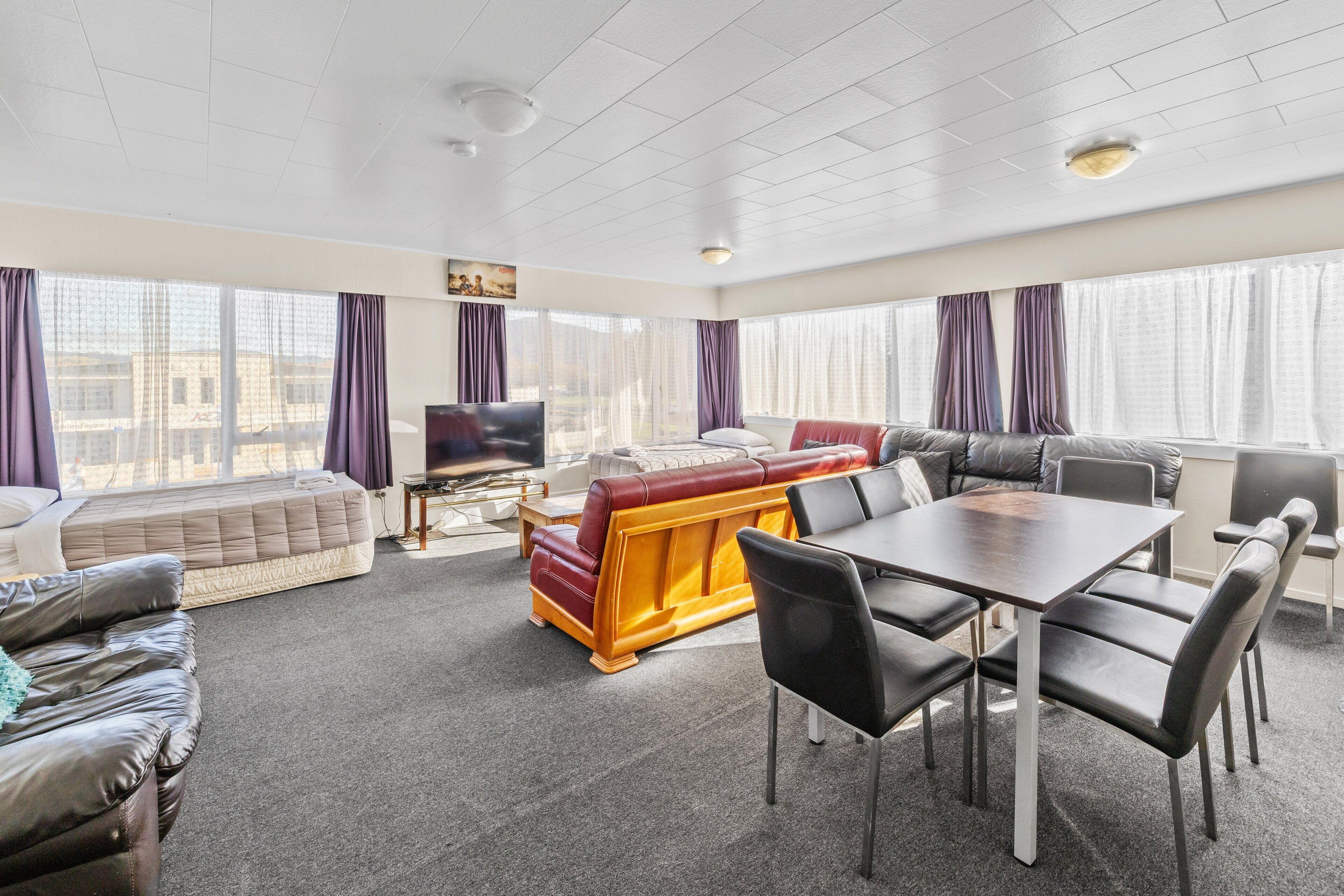 Premium Suite | Desk, blackout drapes, iron/ironing board, free WiFi