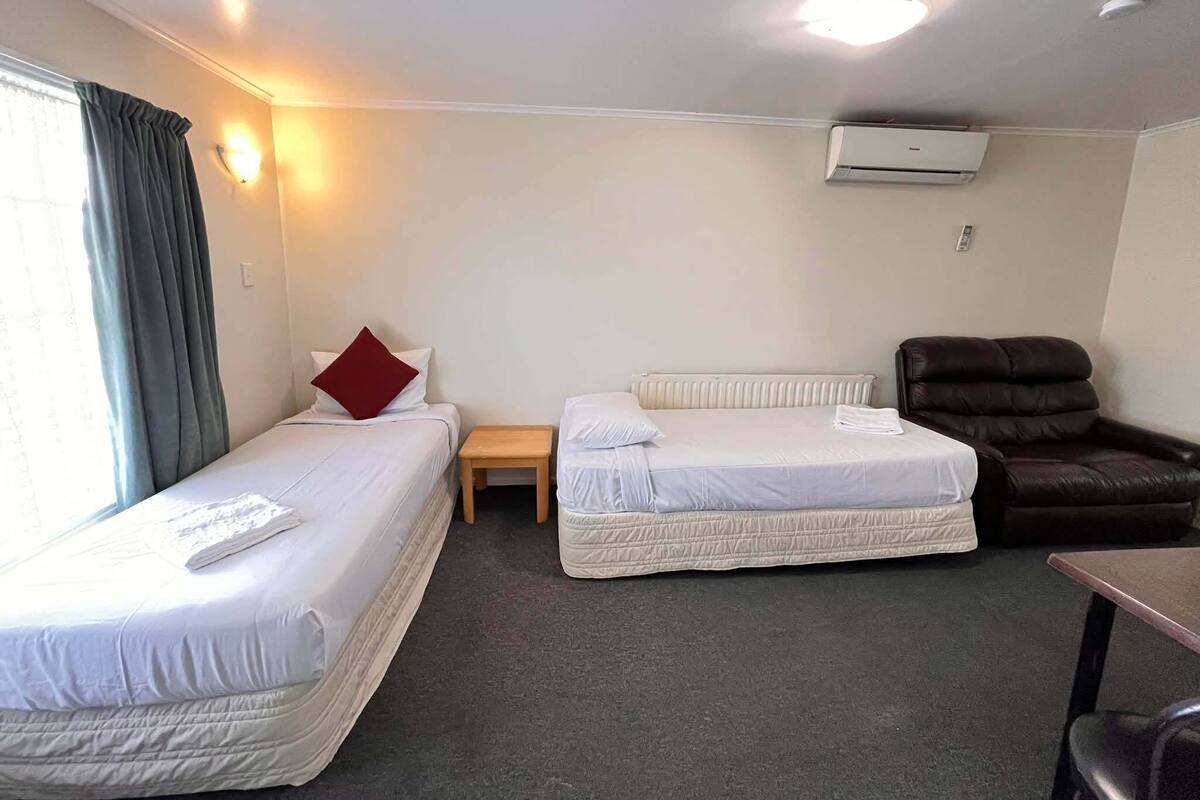 Desk, blackout drapes, iron/ironing board, WiFi (free)