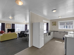 Premium Suite | Desk, blackout drapes, iron/ironing board, free WiFi