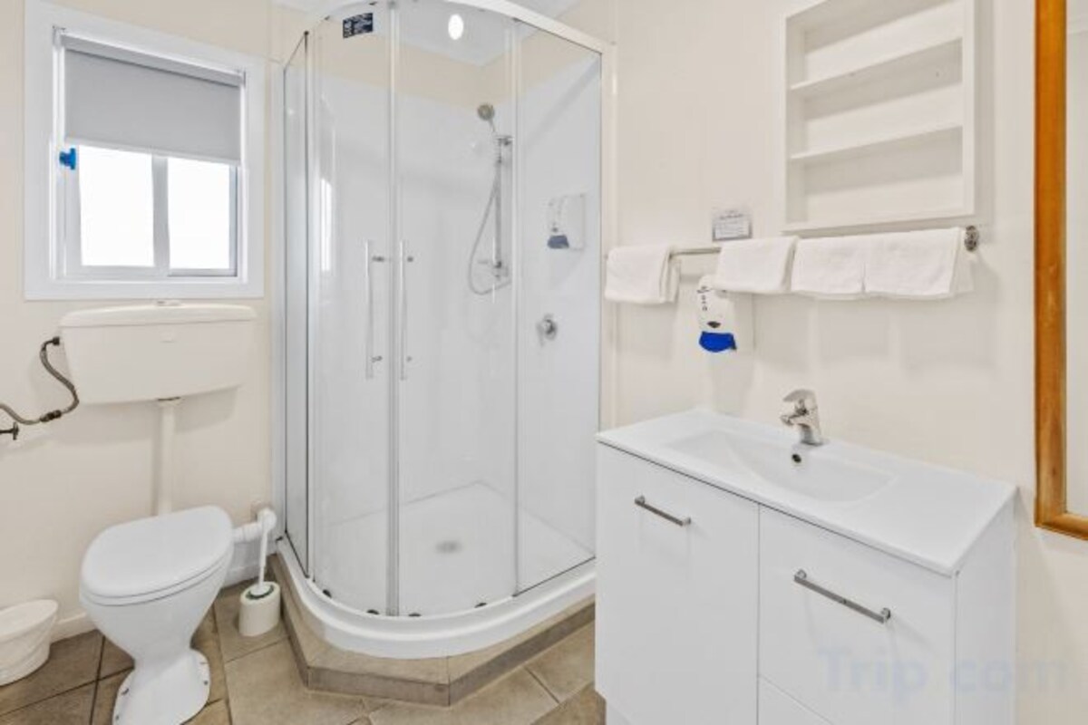 Bathroom | Shower, hydromassage showerhead, hair dryer, towels